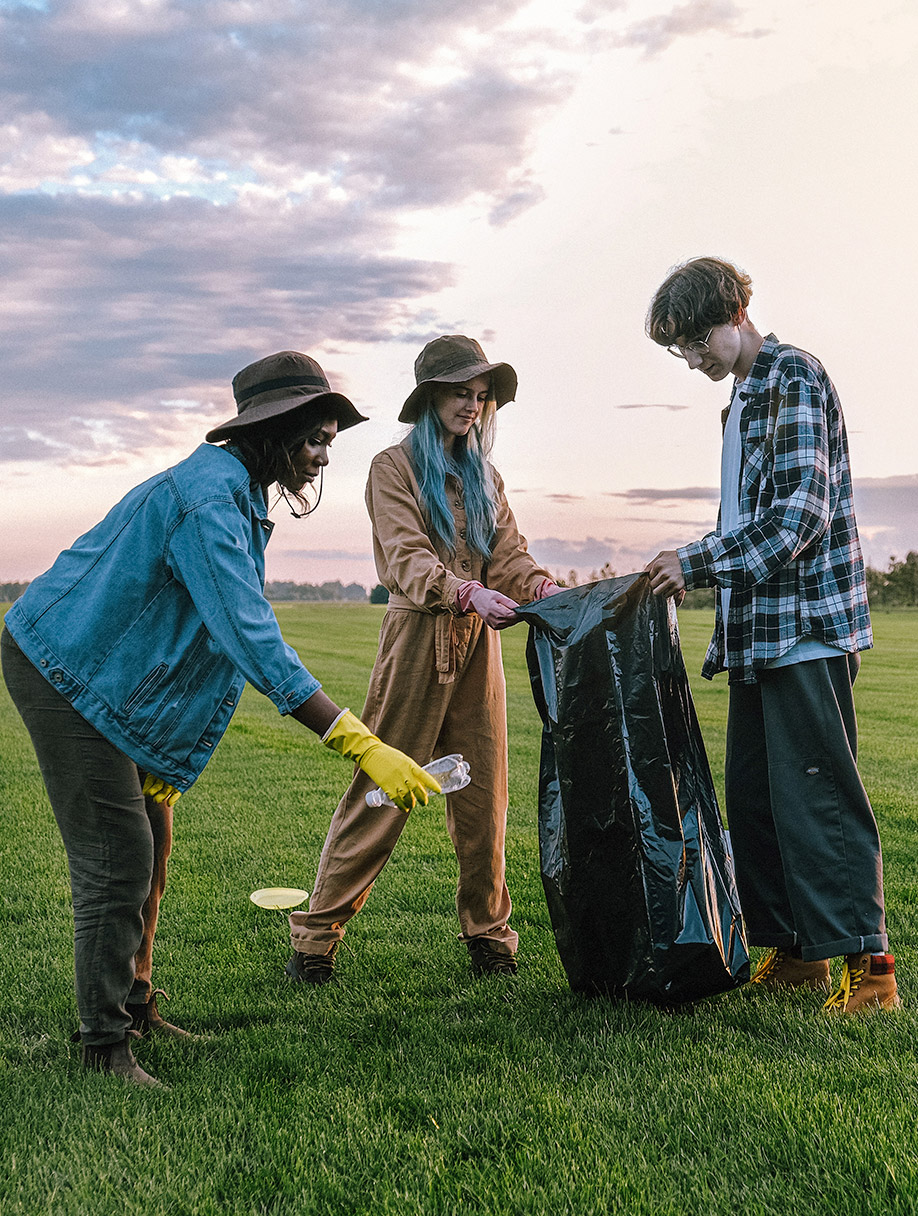 several people cleaning up rubbish